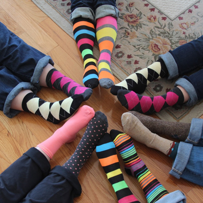 Assorted colorful striped and argyle socks